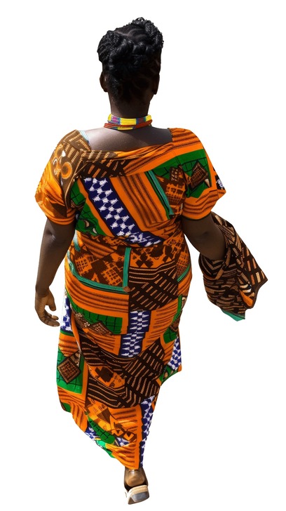 African woman in traditional attire walking seen from above