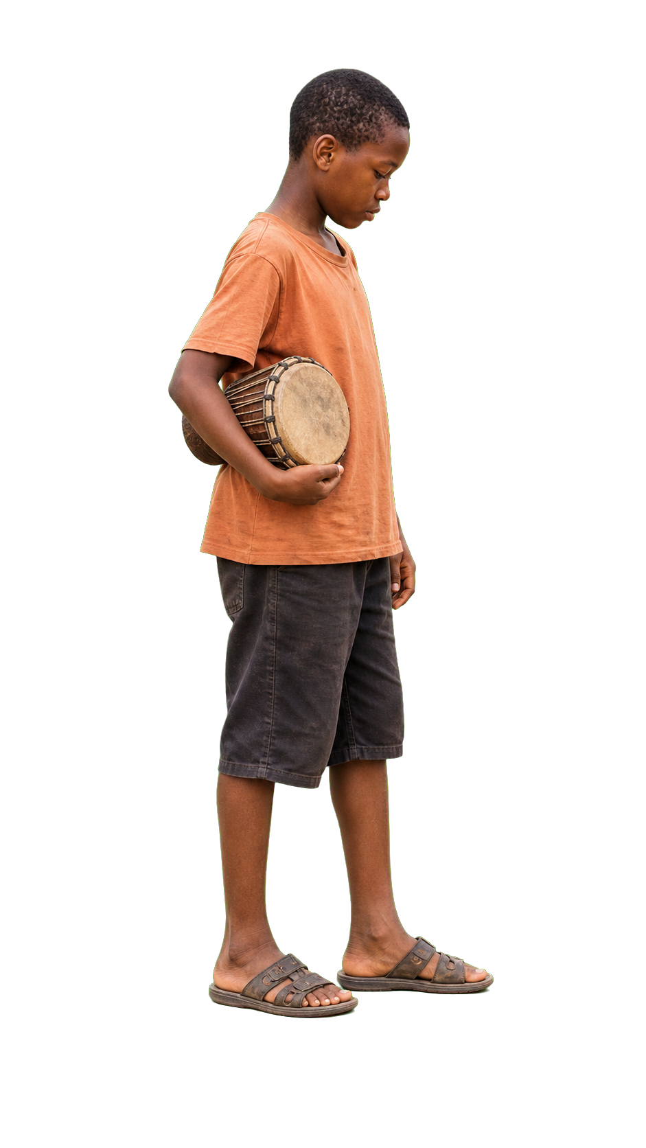 African boy holding small drum under arm