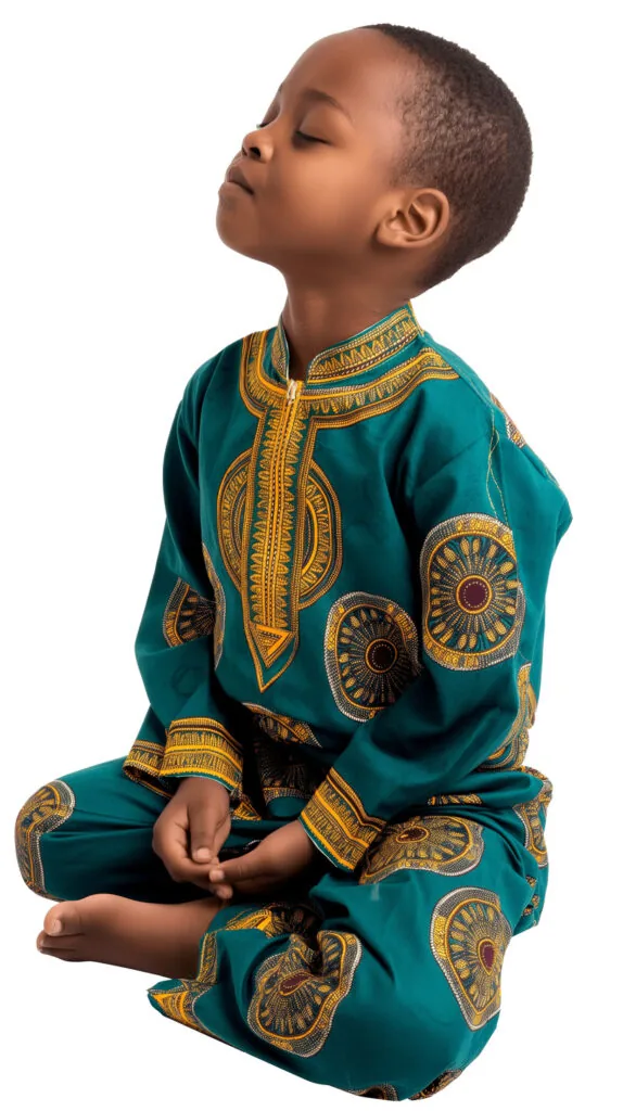 African Boy in Traditional Attire Sitting Eyes Closed