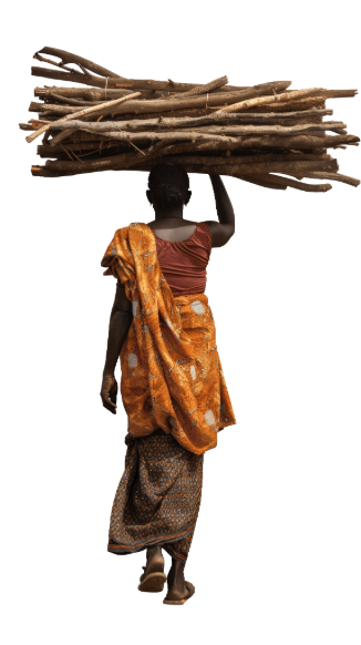African rural woman carrying bundle of wood on her head